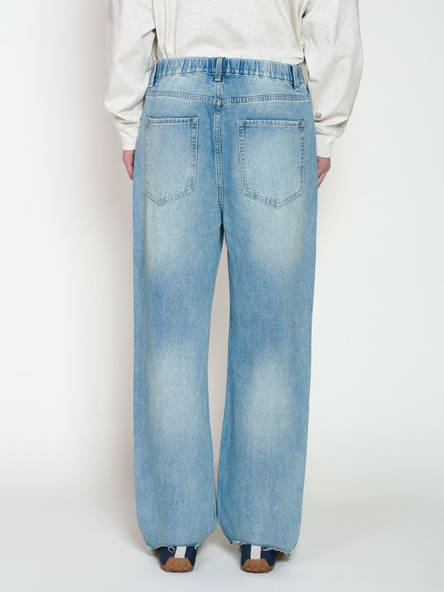 Джинсы с дырками