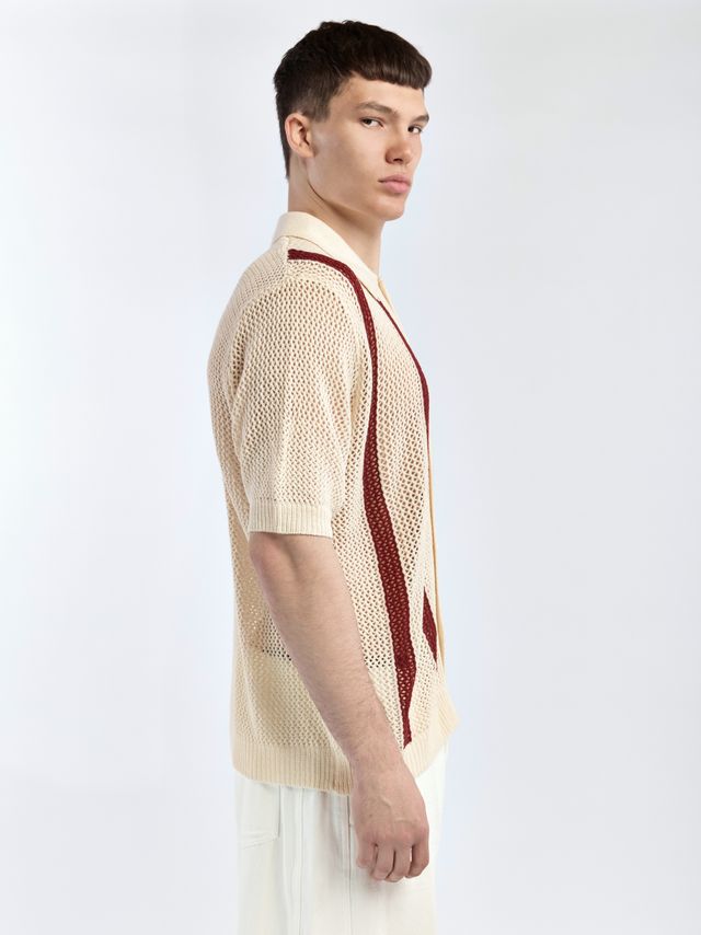 Вязанное поло свободного кроя