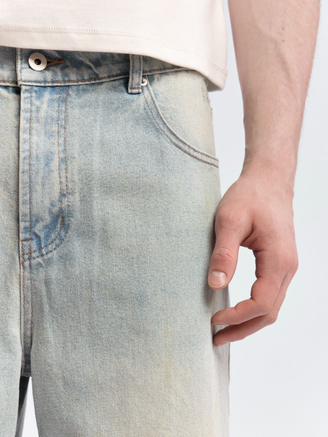 Джинсы с пятнистым принтом