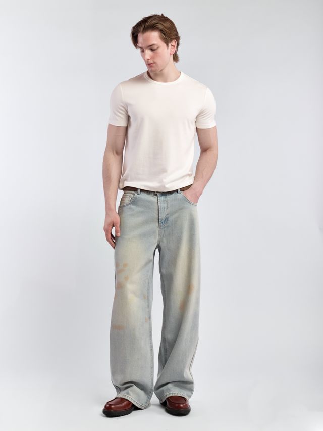 Джинсы с пятнистым принтом