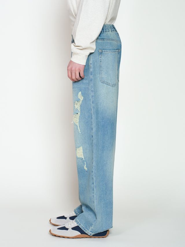 Джинсы с дырками