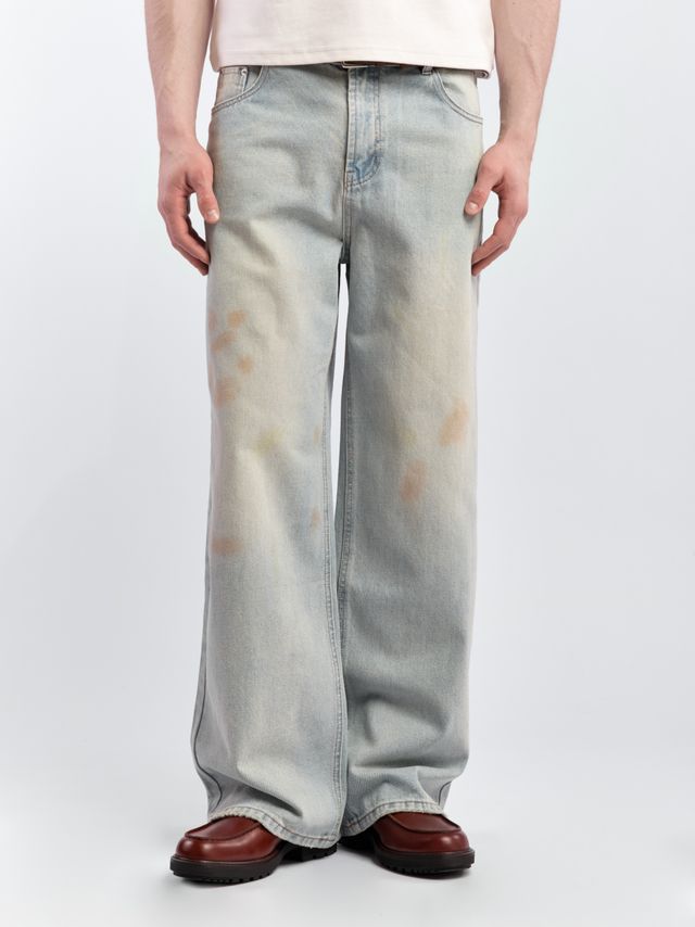 Джинсы с пятнистым принтом