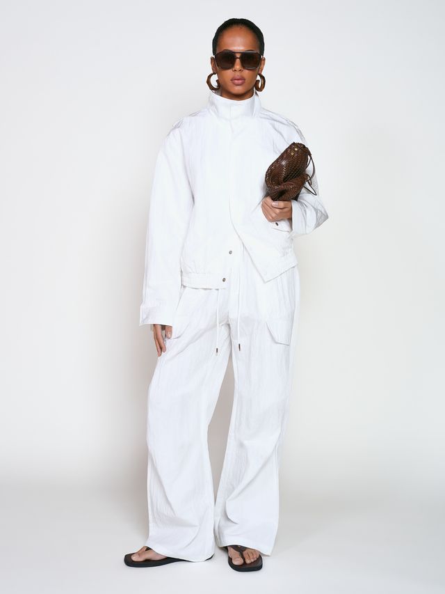 Брюки из жатой ткани с драпировкой