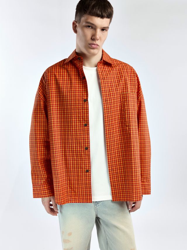 Рубашка в клетку с акцентными пуговицами