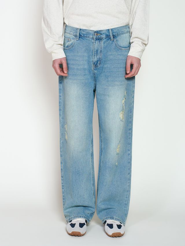 Джинсы с дырками