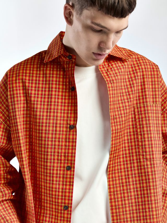 Рубашка в клетку с акцентными пуговицами