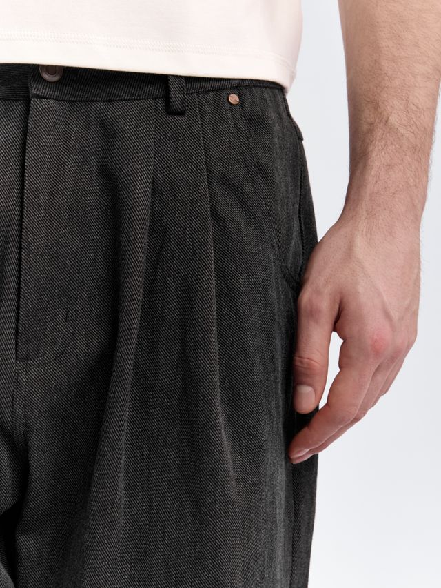 Джинсы с защипами