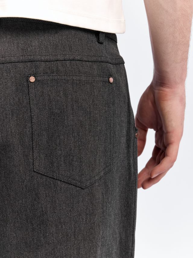 Джинсы с защипами