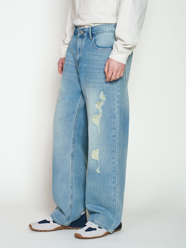 Джинсы с дырками