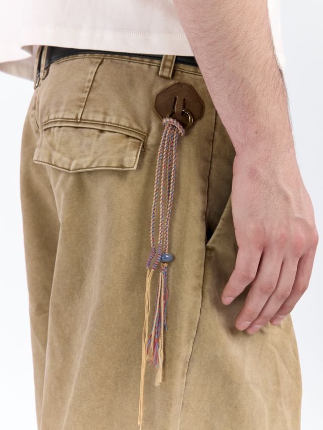 Брюки из выверенного хлопка с брелоком