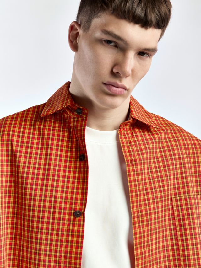 Рубашка в клетку с акцентными пуговицами