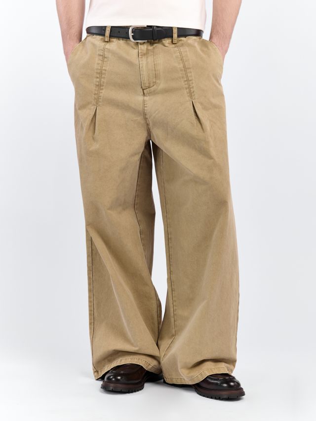 Брюки из выверенного хлопка с брелоком